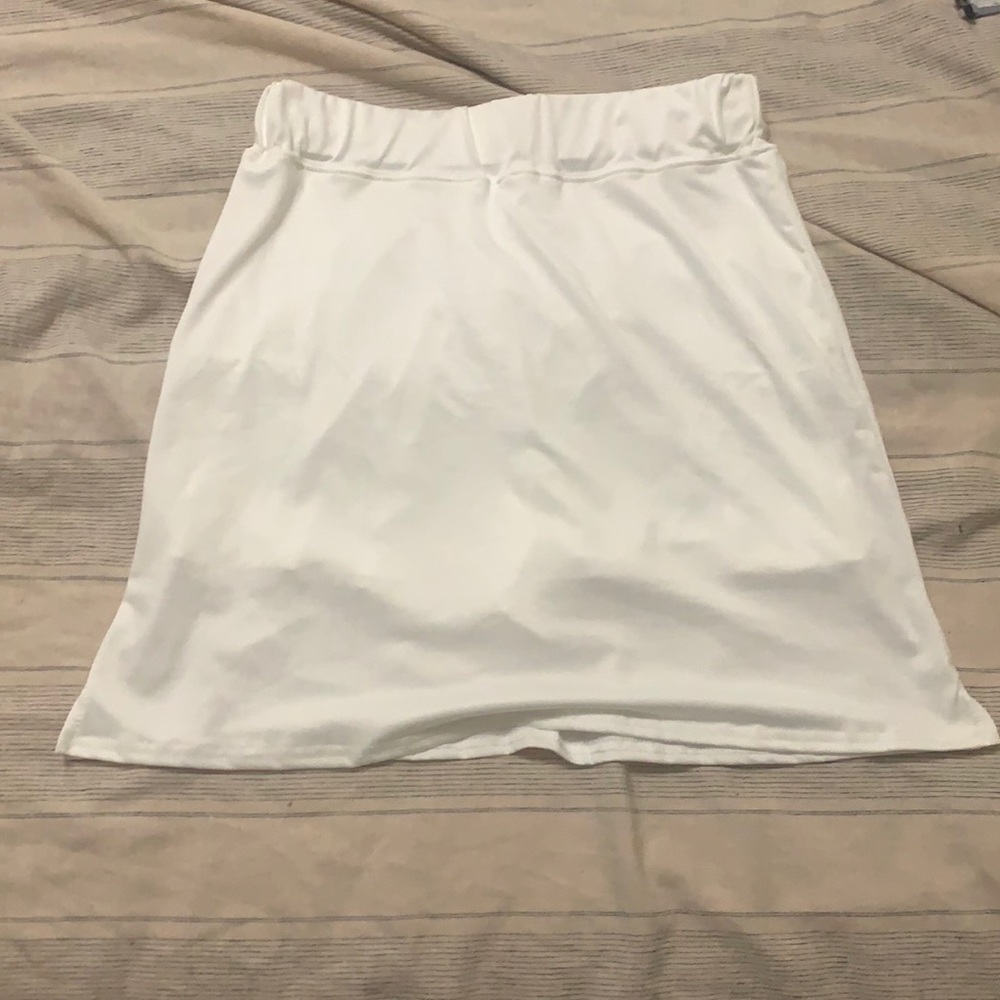 White tennis skirt with shorts underneath 100%polyester